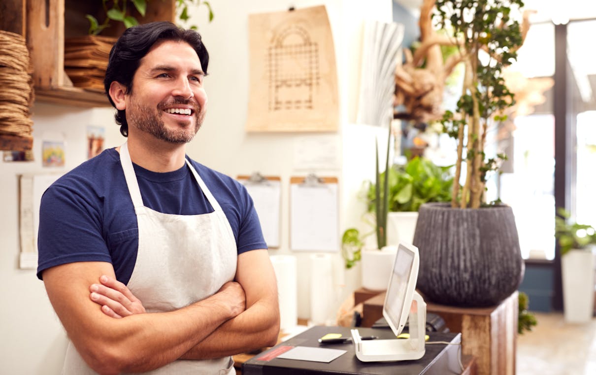 Franchisenehmer in seinem Shop Franchisenehmer in seinem Shop
